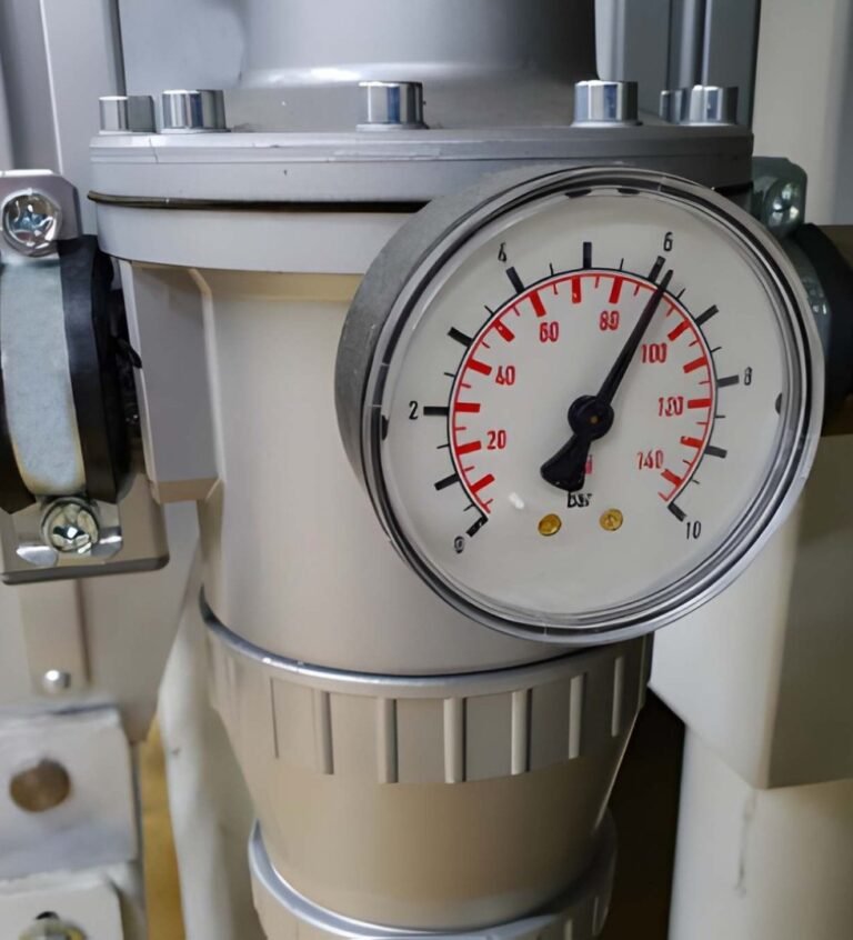 Pressure gauge on industrial equipment