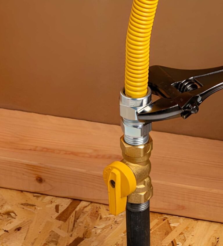 Wrench tightening valve on yellow line.