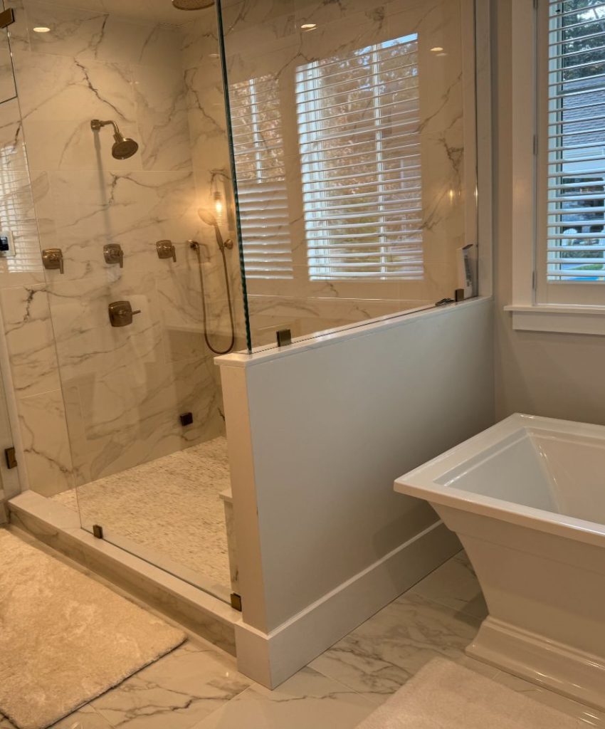 Luxury marble shower and freestanding bathtub