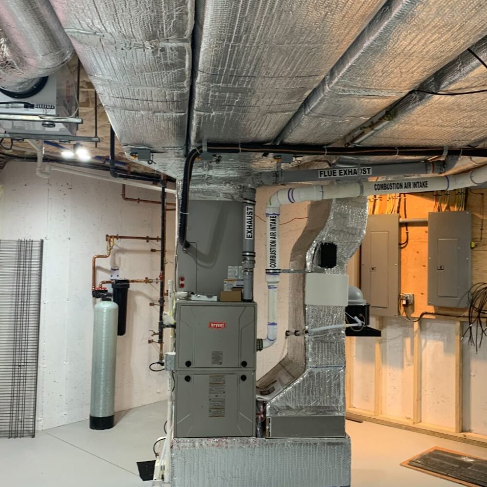 Basement HVAC system with insulation ducts